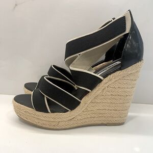 Steve Madden Wedge Sandal. Black and White. Size 9.5. Minor wear and tear